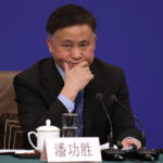 Beijing cuts interest rates and bank reserve requirements