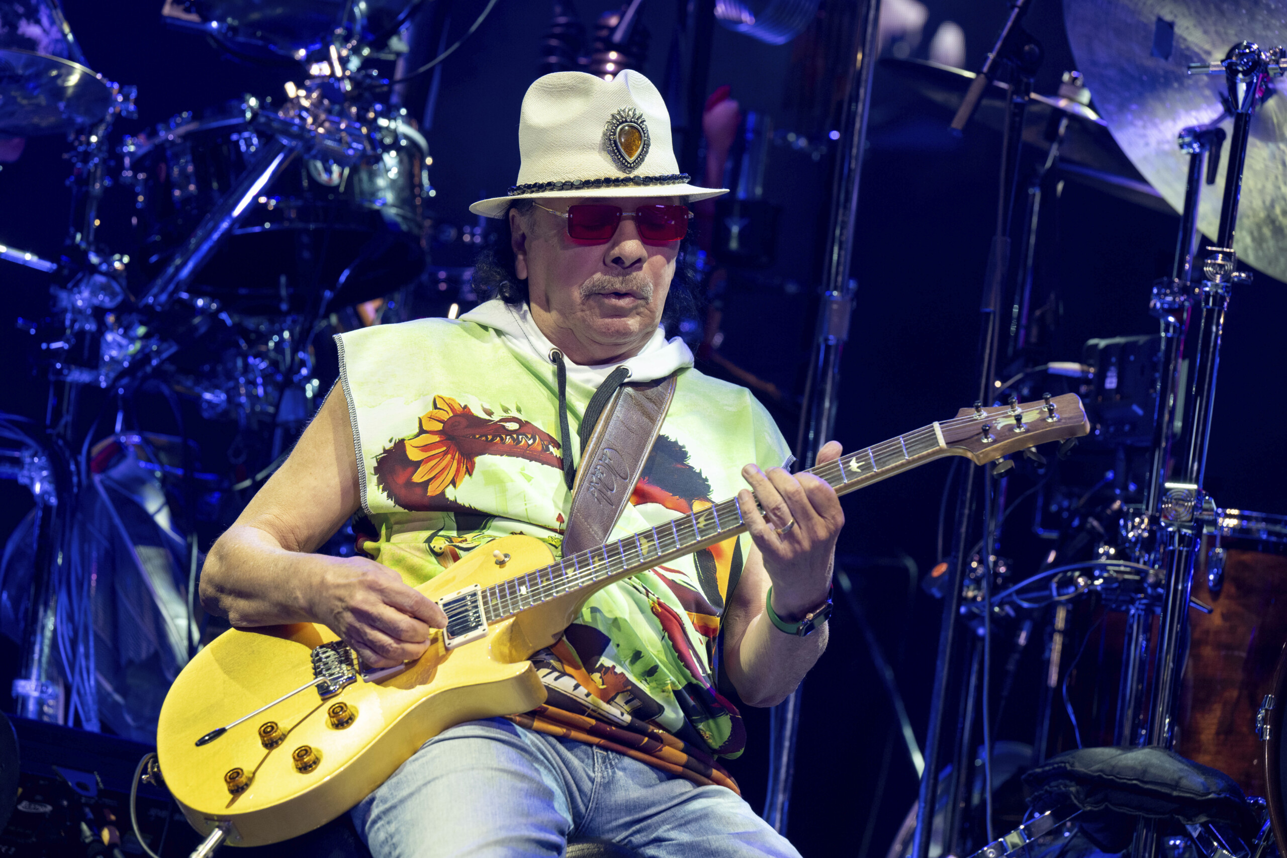 Carlos Santana in hospital postpones concert after illness